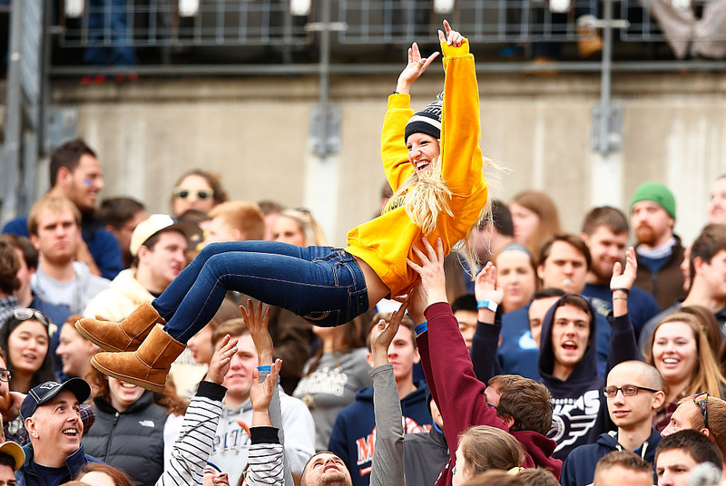 A Pittsburgh Panthers fan is lifted above the crowd following a touchdown in the second half against the Notre Dame Fighting Irish during the game at Heinz Field on Nov. 7, 2015, in Pittsburgh.Jared Wickerham/Getty Images